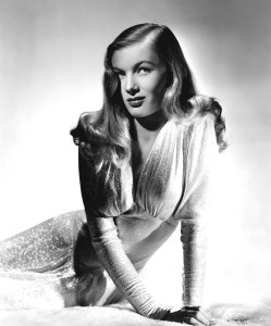 Original caption: 12/6/1942- This Portrait of Veronica Lake is familiar to her admirers. This is the glamorized Veronika, one eye almost hidden by the cascading hair. This coiffure set a trend on the campuses of the country. Veronika may appear big to you, but she is only 89 pounds. And that is petitr in any language. December 6, 1942