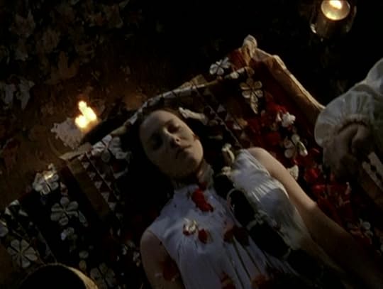 Dead girl on a bier, who looks a lot like Drusilla.
