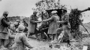 Greek field gun in action during Battle of Morava-Ivan, southern Albania, 14-23 Nov 1940.