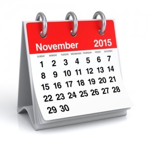 Red Office Desktop 2015 Spiral Calendar. Isolated on White Background. 3D Rendering