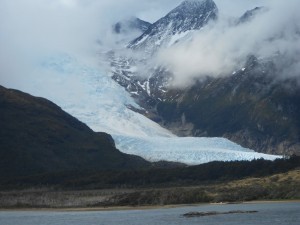 Glacier carving a path into the water.