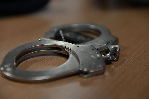 Handcuffs_on_table.JPG