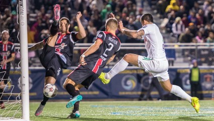 Gaston Cellerino scores the second of his three goals. PHOTO: NASL