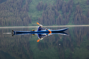 Jacqueline Yau paddles her Kayak off Admiralty Island near Juneau, Alaska.