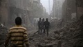 Residents inspect damage from what activists said was an airstrike by forces loyal to Syria's President Bashar al-Assad on the main field hospital in the town of Douma, eastern Ghouta in Damascus (REUTERS/Bassam Khabieh). 