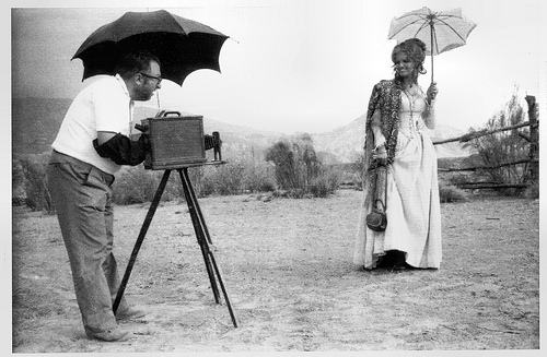 At the set of C'era una volta il West by Sergio Leone with Claudia Cardinale
