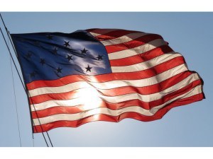american_flag_waving_shutterstock_129353198
