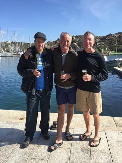 Mission Accomplished: Back at the dock, we toast our swim.