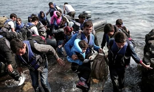 Syrian-Refugees-Coming-Ashore-In-Greece-570x342