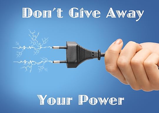 hand holding black electrical plug with wire