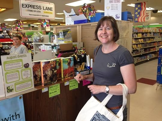 The Jamie August books on display at the front of the Greenbelt Consumer Cooperative. If they're sold out, ask them to order more!