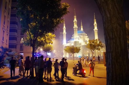 Protesters retreat to Martyrs Square in central Beirut during clashes with security forces on Sunday evening. Photo: Richard Hall/GlobalPost
