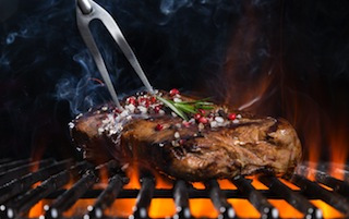 Beef steak on grill