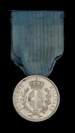The Sardinian Medal for Valour, from the collection of the National Maritime Museum. This example is fitted with a loop and ribbon as originally issued, but some recipients had theirs refitted privately with a suspension bar and ornate suspension arms more in keeping with the appearance of British medals (as was done with the Turkish Crimea Medal too).