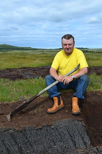 John, holding a tsgeir.