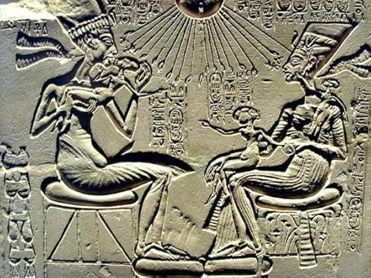 Limestone relief that was probably part of a family worship altar. Akhenaten holding up his firstborn Meritaten and, in front of both, Nefertiti holds Meketaton, her second daughter (who died prematurely), in her lap. On her left shoulder is Anjesenpaaton her third daughter, who later would marry Tutankhamen. Berlin Museum.