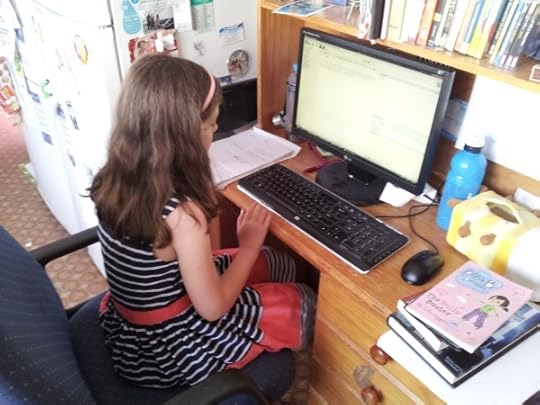 Chloe has her turn at the keyboard.