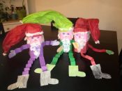 Choose your own color santa suit- Milk Carton Santas. One of many ways to tie Santa's Zany Wacky Just Not Right Night Before Christmas into classroom activities.