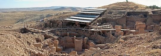 Figure 5. Göbekli Tepe archaeological site in Turkey showing megalithic stones place in circular arrangements. Note the size of the pillars in the middle of the photo compared to the people on the edge of the site to the left of center (https://en.wikipedia.org/wiki/Göbekli_Tepe).