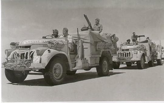 Two Long Range Desert Group trucks armed with water cooled Vickers guns (British government photo)
