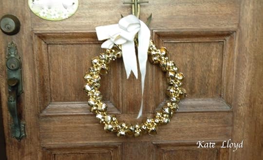 This jingling door wreathe welcomess all who enter.