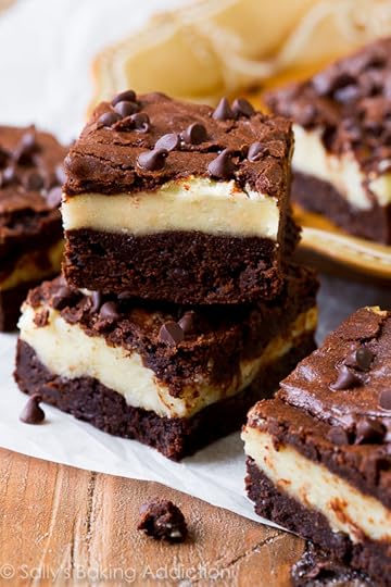 Mocha cheesecake brownies with a homemade mocha brownie layer, cheesecake, white chocolate chips, and more chocolate on top. Completely over the top in the best way!