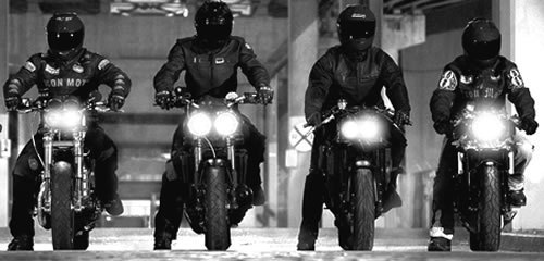 riders in jkts and helmets, etc