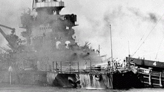 The USS Nevada is aground and burning off Waipio Point, after the end of the Japanese air raid in Pearl Harbor, December 7, 1941.