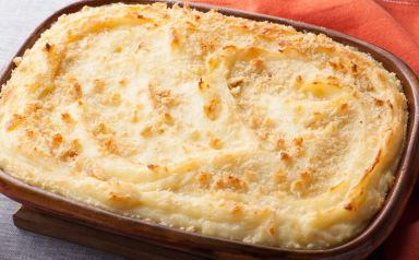 Baked Mashed Potatoes with Parmesan Cheese and Bread Crumbs