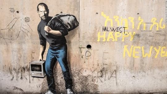 Banksy’s recent portrait of Steve Jobs, the son of Syrian immigrants, on the wall at Calais.