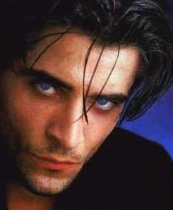 picture of a man's face, with blue eyes