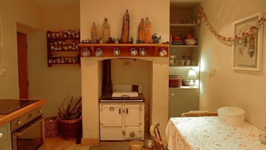 Mexican Santos on kitchen mantle,<br />and the Rayburn stove pumping out its warmth.