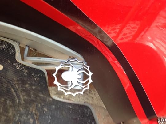 Pedal in the shape of spiderweb.
