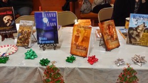 Velda Brotherton book table including Once There Were Sad Songs, Beyond the Moon, Rowena's Hellion, Wolf Song and others