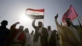 Tribal fighters from Ramadi wave the Iraqi flag and shout slogans in support of Iraqi security forces in Kerbala June 15, 2014. The insurgent offensive that has threatened to dismember Iraq spread to the northwest of the country on Sunday, when Sunni militants launched a dawn raid on a town close to the Syrian border, clashing with police and government forces. REUTERS/Mushtaq Muhammed (IRAQ - Tags - Tags: CIVIL UNREST POLITICS MILITARY)