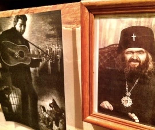 Johnny Cash and St. John Maximovitch, on the wall at the Eighth Day Institute's Hall of Men (Photo by Rod Dreher)