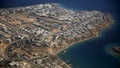 An aerial view of part of the coast the Red Sea with hotels and resorts of Sharm el-Sheikh, is pictured and seen through the window of an airplane, Egypt, December 7, 2015. REUTERS/Amr Abdallah Dalsh