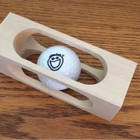 Golf-Ball-inside-a-block-of-wood-2