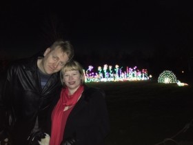 Me and Glenn with light peacock and flower garden at Bellevue Botanical Gardens