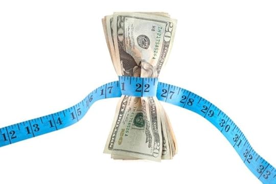 Tape measure around $20 bills