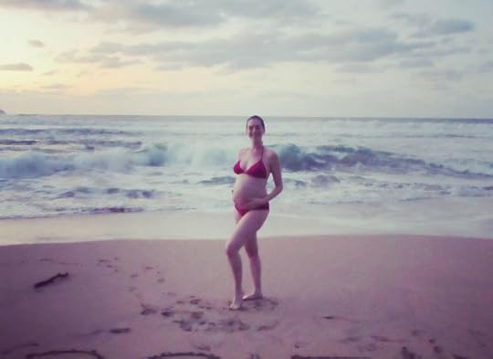 Anne Hathaway Reveals Baby Bump In Skimpy Red Bikini