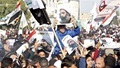 Supporters of Shi'ite cleric Moqtada al-Sadr protest against the execution of Shi'ite Muslim cleric Nimr al-Nimr in Saudi Arabia, during a demonstration in Baghdad January 4, 2016. REUTERS/Thaier Al-Sudani