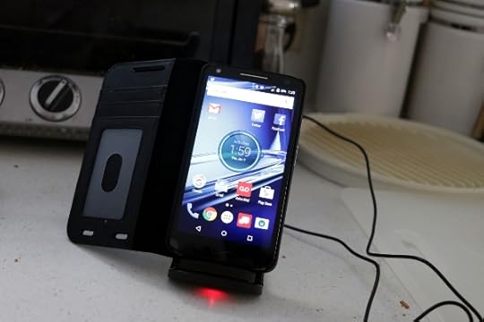 My new phone on the wireless charger.