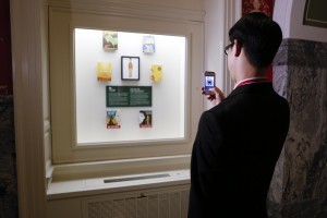 Gene Luen Yang looks over a display of his work outside the Library's Young Readers Center. Photo by Shawn Miller.