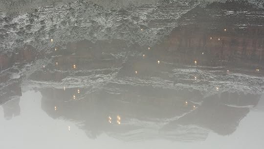 Restaurant view with the reflection of indoor lights through the glass