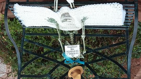 This funny little set up that someone did on a bench, hoping for donations. Funnier, because my husband has the same name.