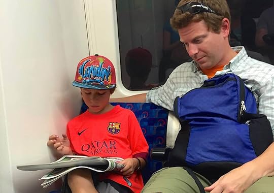 rory-moulton-tube-london-newspaper