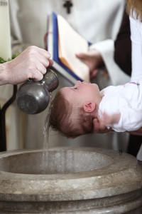 Baptism of a little baby in church