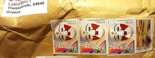 package with Greek postage stamps