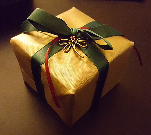 box wrapped in gold cloth